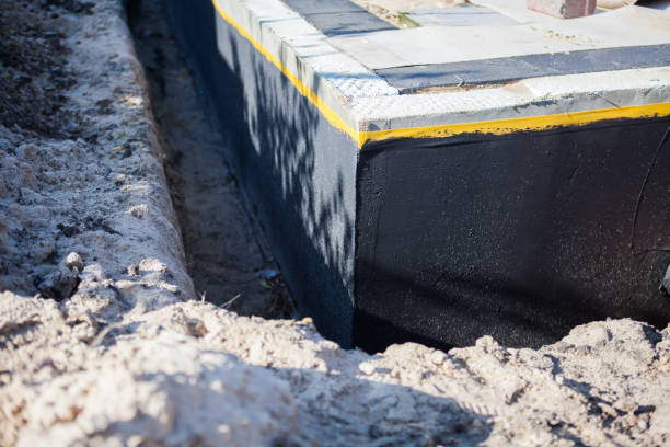 Professional Emergency Waterproofing technician working in White Marsh, MD